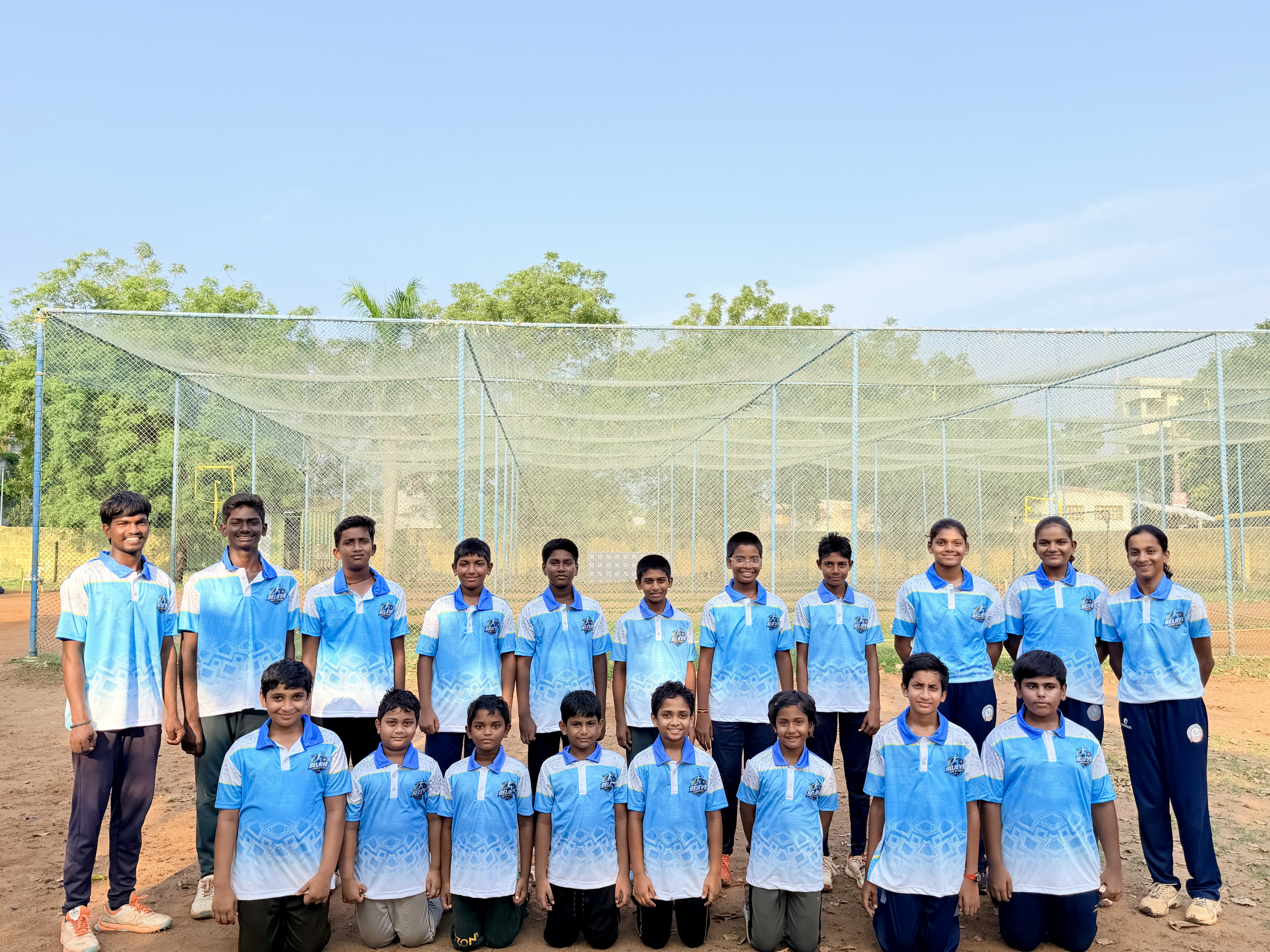 Believe Cricket Academy players together at the practice nets